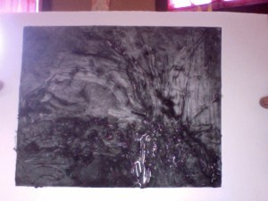 A black relief print.